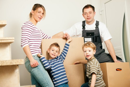 Packed office furniture and equipment prepared for a business move