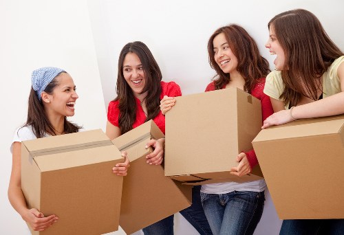 Packed boxes and furniture ready for a Docklands house move
