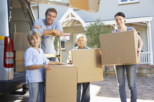 Packed boxes and furniture loaded for a Docklands relocation