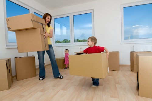 Professional movers loading items in a Docklands street