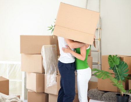 Furniture and boxes ready for a man and van move in Docklands