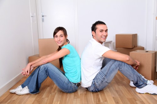 Docklands residential move with a removal van outside a modern apartment block