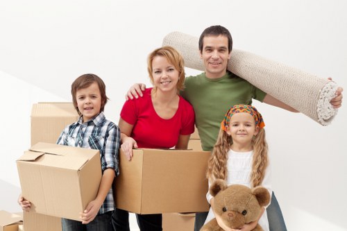 Removal company team handling furniture in Docklands