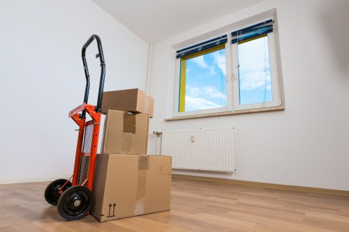 Packed office equipment ready for relocation in Docklands