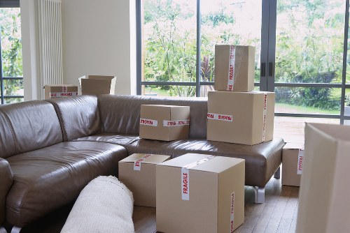 Packed boxes and furniture ready for a Docklands house removal